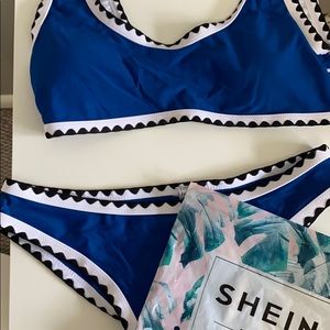 Blue black and white trimmed bikini